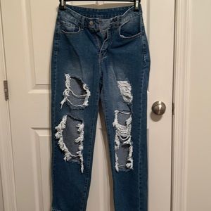 Ripped blue denim jeans